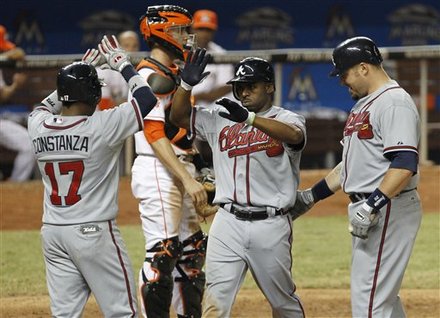 Atlanta Braves' Michael Bourn, Second From Right, Is Congratulated By Teammates Jose Constanza (17) And Eric Hinske,