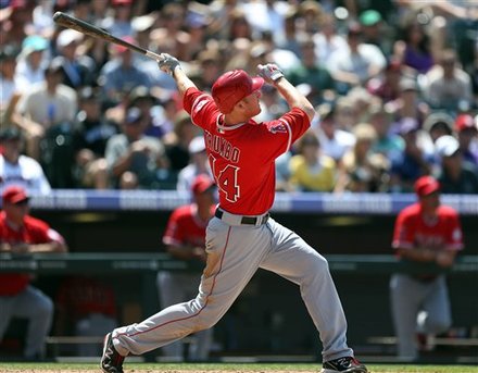 Los Angeles Angels' Mark Trumbo (44) Watches The Flight Of His Three-run Home Run Ball Hit Off Colorado Rockies 