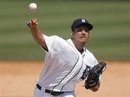 Detroit Tigers relief pitcher Brayan Villarreal throws during the seventh inning against the Atlanta Braves in a spring training baseball game in Lakeland, Fla., Tuesday, March 20, 2012. Detroit won 7-2.