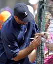 Detroit Tigers starting pitcher Justin Verlander signs autographs prior to a spring training baseball game against the Atlanta Braves , Wednesday, March 7, 2012, in Lakeland, Fla.