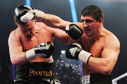 Germany's Marco Huck , Right, Fights