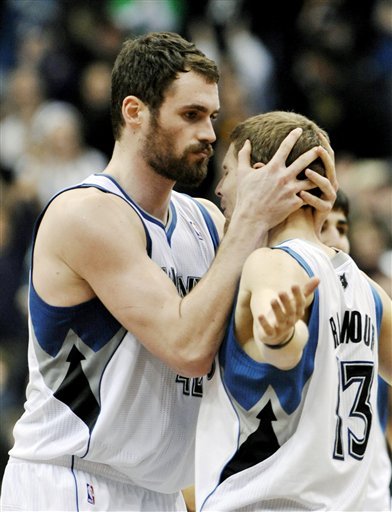 Minnesota Timberwolves' Kevin Love, Left, And Luke Ridnour Celebrate Love's Go-ahead Free Throw With Less