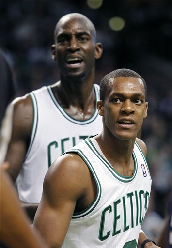 Boston Celtics' Rajon Rondo, Right, And Boston Celtics' Kevin Garnett Look To The Referee