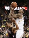 Baylor forward Perry Jones III (1) is fouled attempting a shot by Texas Tech 's Ty Nurse, bottom, in the second half of an NCAA college basketball game Monday, Feb. 27, 2012, in Waco, Texas. Jones III had 15 points and 10 rebounds in the 77-48 Baylor win.