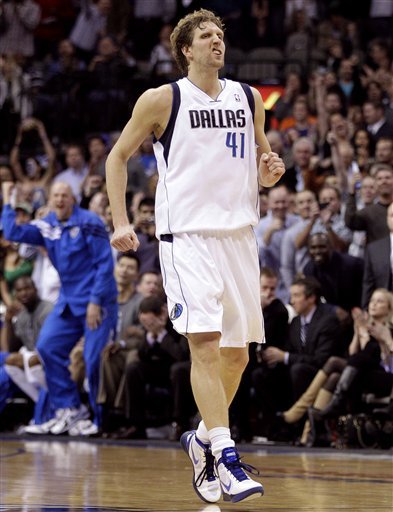 Dallas Mavericks' Dirk Nowitzki (41), Of Germany, Celebrates