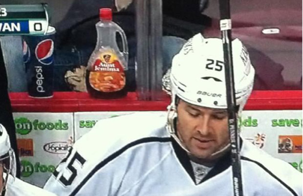 Pancakes fan Dustin Penner autographed box of Aunt Jemima; there’s syrup behind Kings bench
