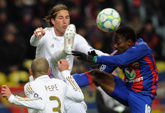 Pepe (L), Sergio Ramos (C) Of Real Madrid Fight For The Ball Against Ahmed Musa (R) Of CSKA Moscow