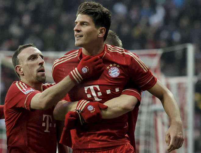 Bayern Munich's German Striker Mario Gomez (R) Celebrates Scoring With His French Teammate Midfielder Franck Ribery 