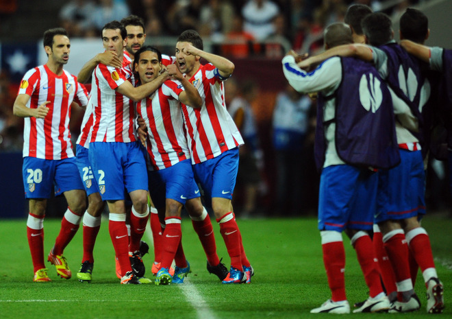 Atletico Madrid's Colombian Forward Radamel Falcao (4th L) Celebrates