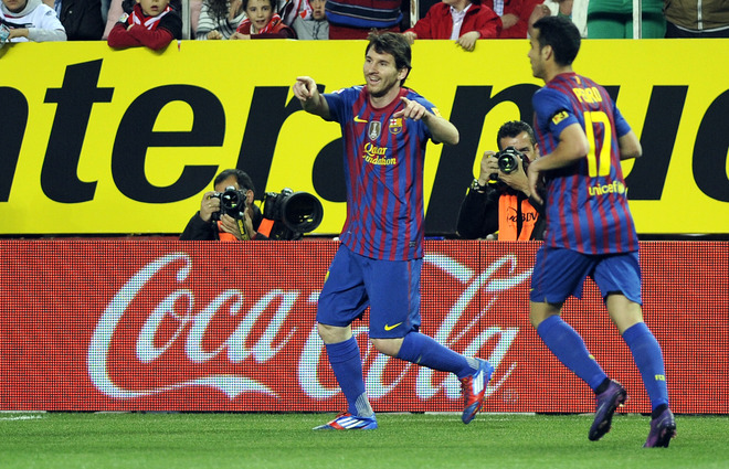 Barcelona's Argentinian Forward Lionel Messi (L) Celebrates