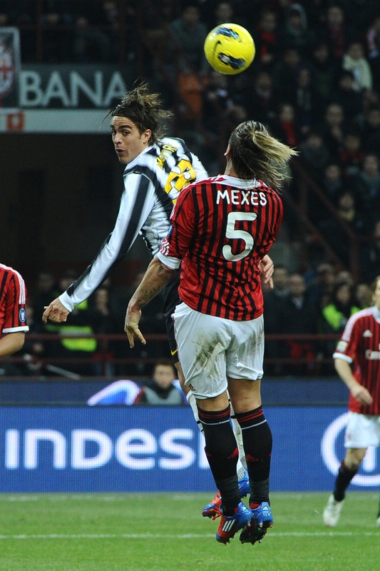 Juventus Forward Alessandro Matri (L) Fights For The Ball With AC Milan's French Defender Philippe Mexes On February 25,
