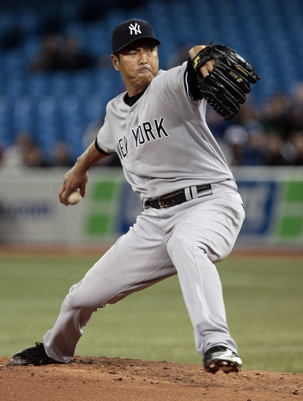  Hiroki Kuroda #18 Of The New York Yankees Throws