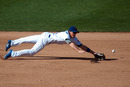 MESA, AZ - MARCH 8: Josh Vitters #61 of the Chicago Cubs dives for a ball during the game against the Seattle Mariners at HoHoKam Stadium on March 8, 2012 in Mesa, Arizona. (Photo by Rob Tringali/Getty Images)