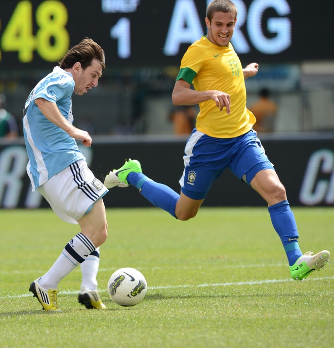 Argentine Player Lionel Messi (L) Kicks