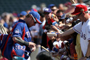 SURPRISE, AZ - MARCH 09: Josh Hamilton #32 of the Texas Rangers signs autographs for fans before the spring training game against the Los Angeles Dodgers at Surprise Stadium on March 9, 2012 in Surprise, Arizona. (Photo by Christian Petersen/Getty Images)