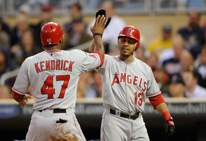  Maicer Izturis #13 Of The Los Angeles Angels Of Anaheim Congratulates Howard Kendrick #47 On Scoring Against The