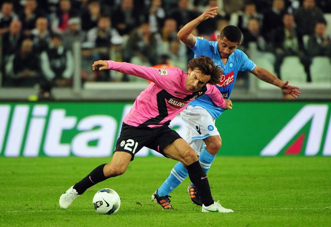 Juventus' Midfielder Andrea Pirlo (L) Fights