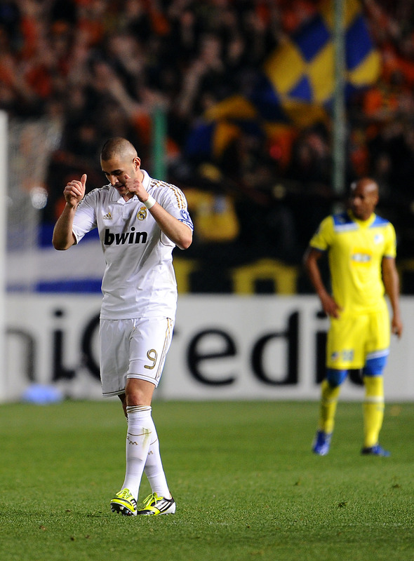 Real Madrid's French Forward Karim Benzema Celebrates