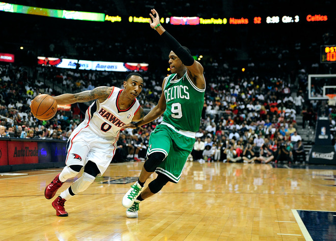   Rajon Rondo #9 Of The Boston Celtics Defends