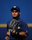 PHOENIX, AZ - MARCH 08: Norichika Aoki #7 of the Milwaukee Brewers in action against the Cincinnati Reds during a spring training baseball game against the Cincinnati Reds at Maryvale Baseball Park on March 8, 2012 in Phoenix, Arizona. (Photo by Kevork Djansezian/Getty Images)