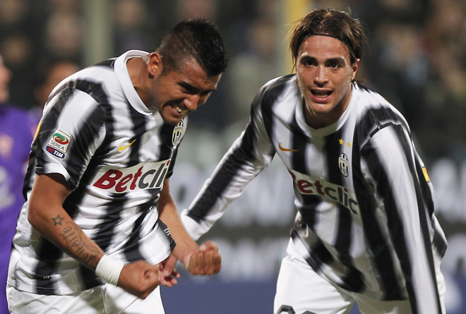 Juventus' Arturo Vidal (C) Celebrates