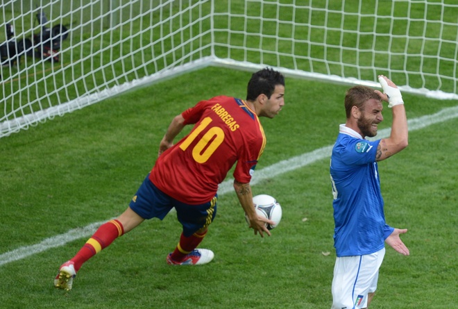 Spanish Forward Cesc Fabregas (L) Reacts