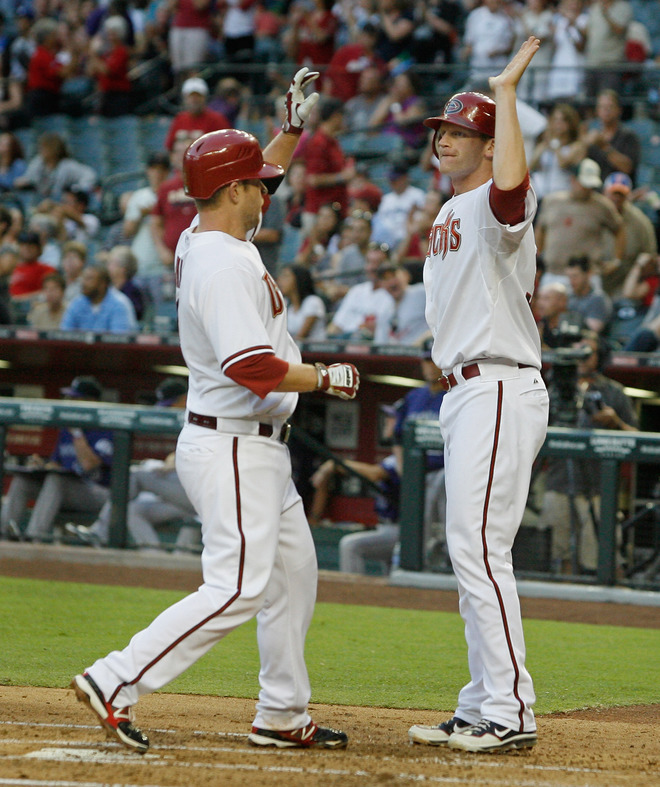   Aaron Hill #2 Of The Arizona Diamondbacks Is Congratulated By Teammate Lyle Overbay #37 Following His Two-run Home