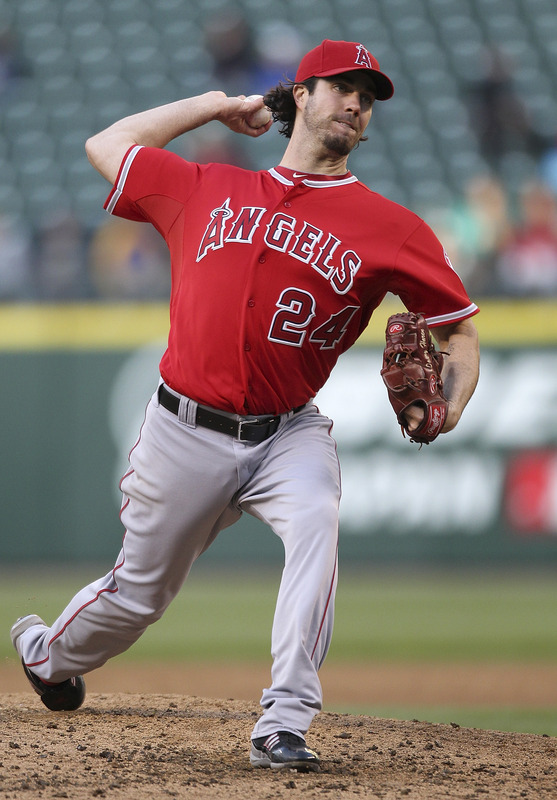   Starting Pitcher Dan Haren #24 Of The Los Angeles Angels Of Anaheim Pitches