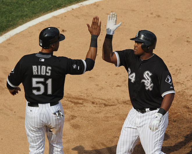  Alex Rios #51 And Dayan Viciedo #24 Of The Chicago White Sox Celebrate