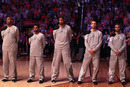 PHOENIX, AZ - MARCH 27:  (L-R) Boris Diaw #33, Patrick Mills #8, Tim Duncan #21, Manu Ginobili #20 and Tony Parker #9 of the San Antonio Spurs stand attended for the National Anthem before the NBA game against the Phoenix Suns at US Airways Center on March 27, 2012 in Phoenix, Arizona.  The Spurs defeated the Suns 107-100.  NOTE TO USER: User expressly acknowledges and agrees that, by downloading and or using this photograph, User is consenting to the terms and conditions of the Getty Images License Agreement.  (Photo by Christian Petersen/Getty Images)