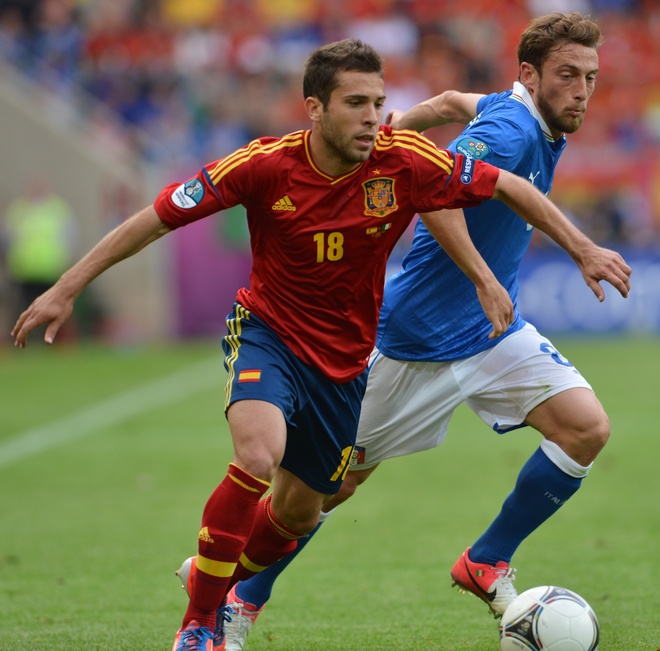 Spanish Defender Jordi Alba (L) Vies