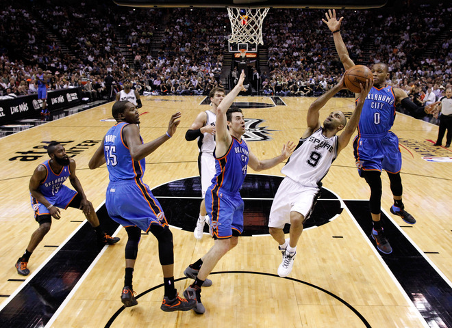   Tony Parker #9 Of The San Antonio Spurs Goes Up For A Shot In Front Of Russell Westbrook #0 Of The Oklahoma City