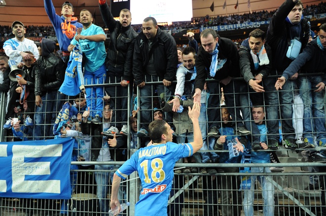 Olympique De Marseille's Midfielder Morgan Amalfitano (C) Celebrates