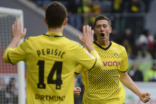 Dortmund's Polish Striker Robert Lewandowski (R) Celebrate Scoring A Goal With Team Mate Dortmund's Croatian Midfielder