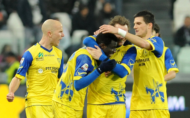 Chievo's French Defender Boukary Drame (2nd L) Celebrates