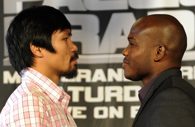 Undefeated Junior Welterweight Champion Manny “Pacman”  Pacquiao  Faces Off With Timothy 