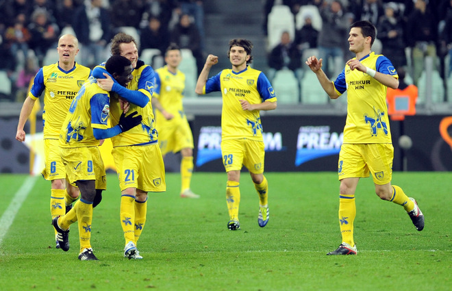 Chievo's French Defender Boukary Drame (2nd L) Celebrates