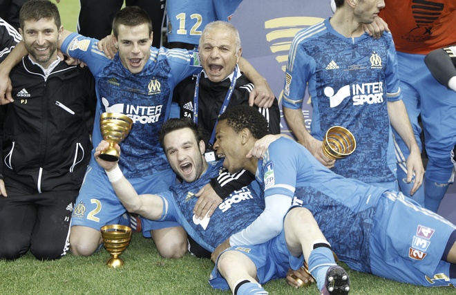 Olympique De Marseille's Midfielder Mathieu Valbuena (C) Celebrates With Teammates Olympique De Marseille's Forward