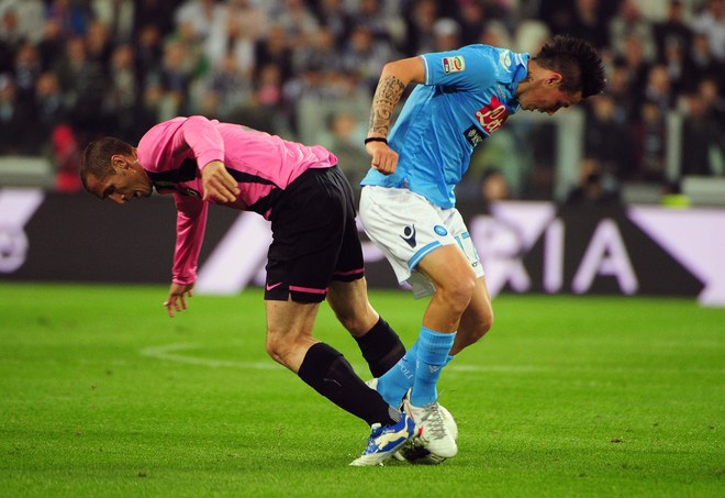 Juventus' Defender Giorgio Chiellini (L) Fights