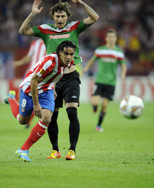 Atletico Madrid's Colombian Forward Radamel Falcao (front) Vies