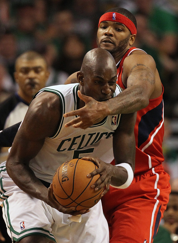   Kevin Garnett #5 Of The Boston Celtics Battles Josh Smith #5 Of The Atlanta Hawks In Game Four Of The Eastern