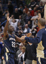 HARTFORD , CT - JANUARY 29: Jerian Grant #22 of the Notre Dame Fighting Irish is congratulated by teammates after the game against the Connecticut Huskies on January 29, 2012 at the XL Center in Hartford, Connecticut. The Notre Dame Fighting Irish defeated the Connecticut Huskies 50-48. (Photo by Elsa/Getty Images)