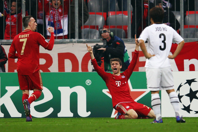  Thomas Mueller (C) Of Muenchen Celebrates His Team's Second Goal With Team Mate Franck Ribery As Park Joo Ho Of Basel