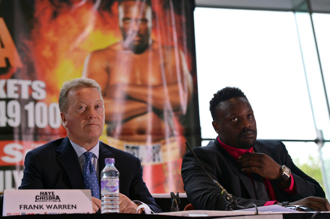 British Boxer Dereck Chisora (R) And Boxing Promoter Frank Warren (L) Attend A Press