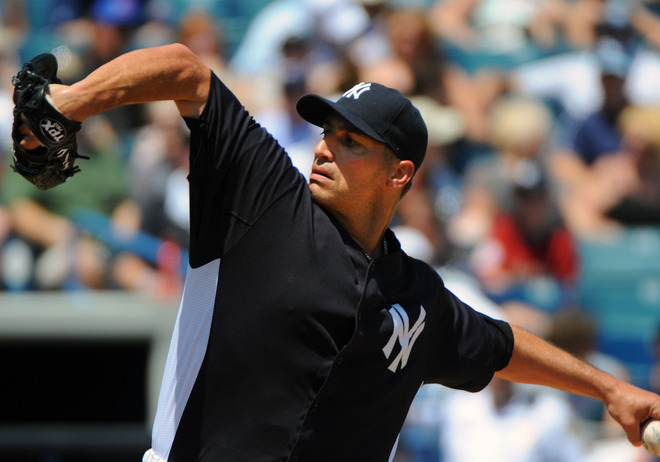  Pitcher Andy Pettitte #46 Of The New York Yankees Throws