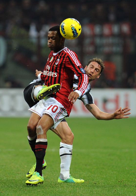   Robinho (L) Of AC Milan Is