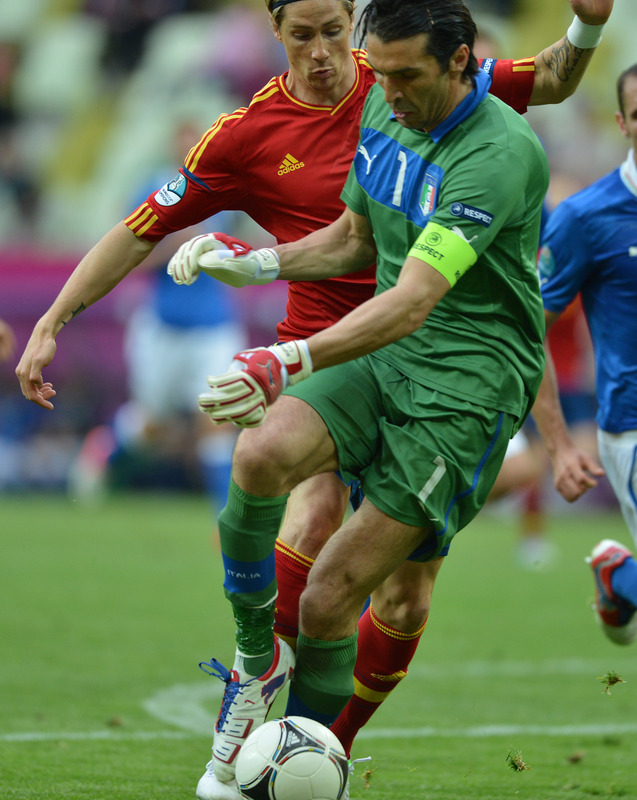 Italian Goalkeeper Gianluigi Buffon (R) Vies