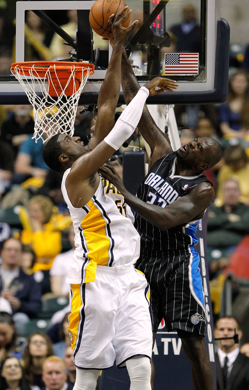  Ryan Anderson #33 Of The Orlando Magic Tries To Get To The Rim For A Dunk Past Roy Hibbert #55 Of The Indiana Pacers