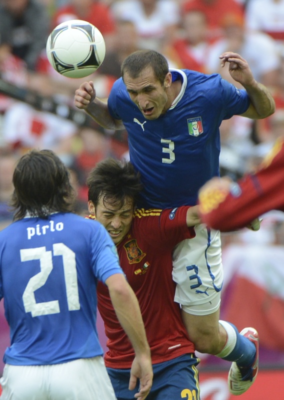 Italian Defender Giorgio Chiellini (top) Heads