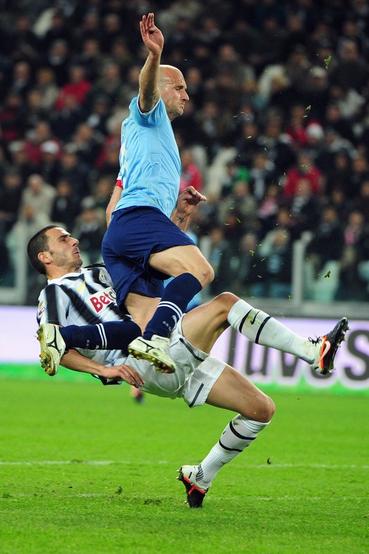 Lazio's Forward Tommaso Rocchi (R) Fights